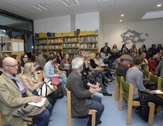 Publikum in Sesselreihen