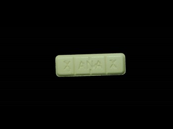 Dieses Bild zeigt eine weiße Pille (Logo Xanax)